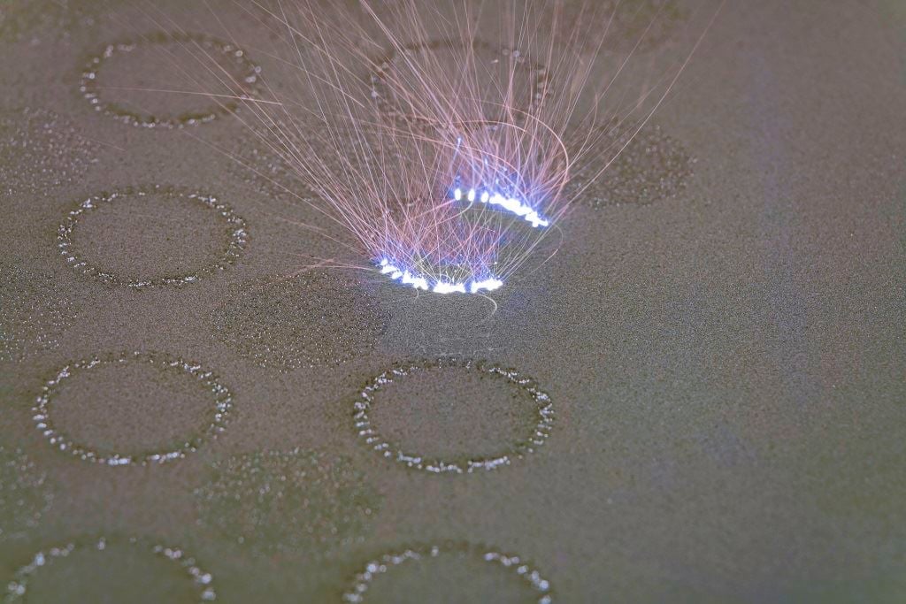  Selective laser melting in process [Image: SLM Solutions] 
